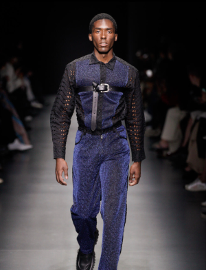 An IES Abroad student walks in Milan Fashion Week.